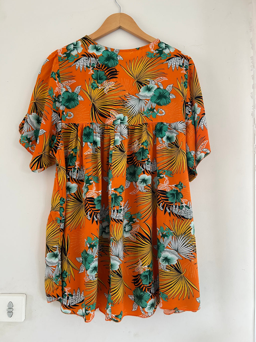 Top péplum manches courtes motif tropical taille 54