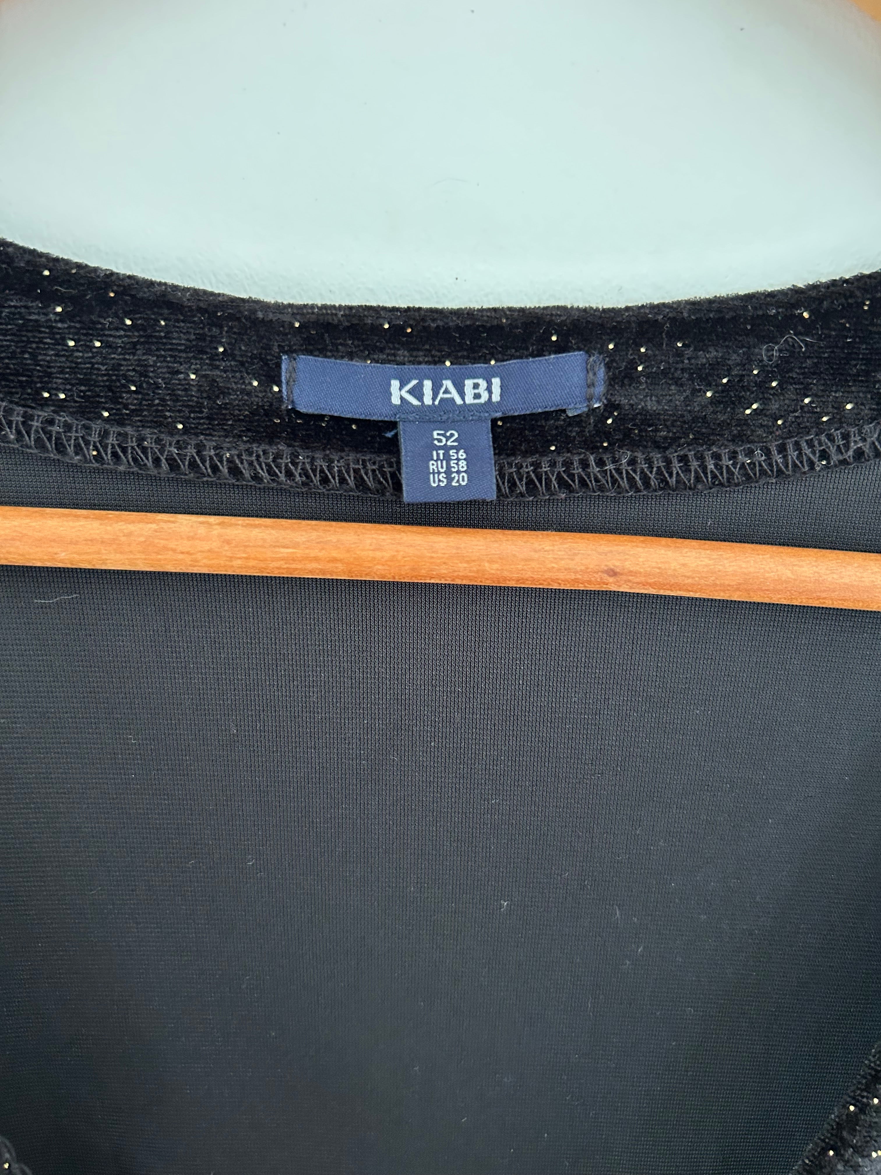 Combinaison short manches longues effet velours noir pailleté doré avec poches Kiabi taille 52