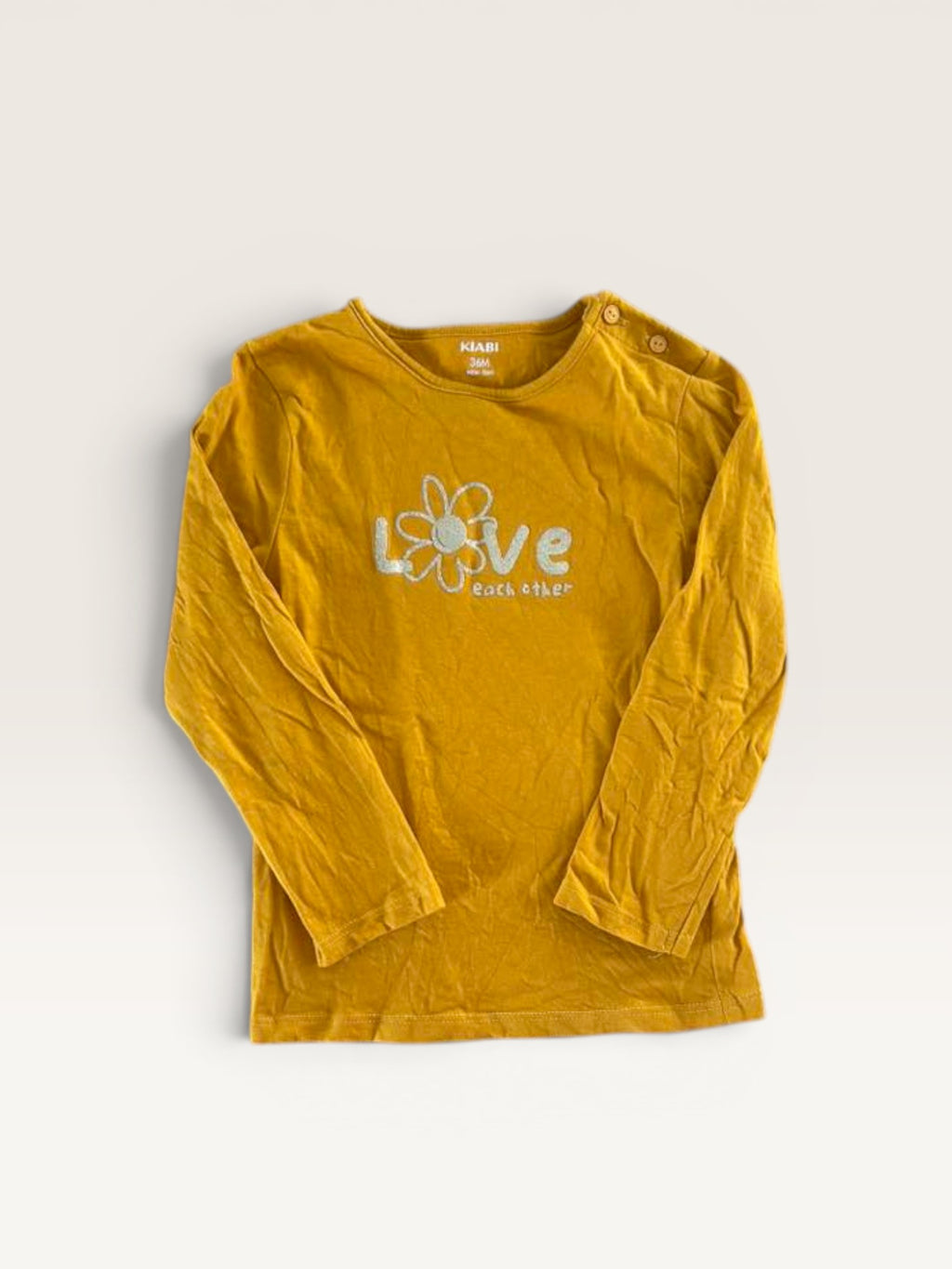 T-shirt manches longues jaune moutarde "love" pailleté Kiabi taille 36 mois