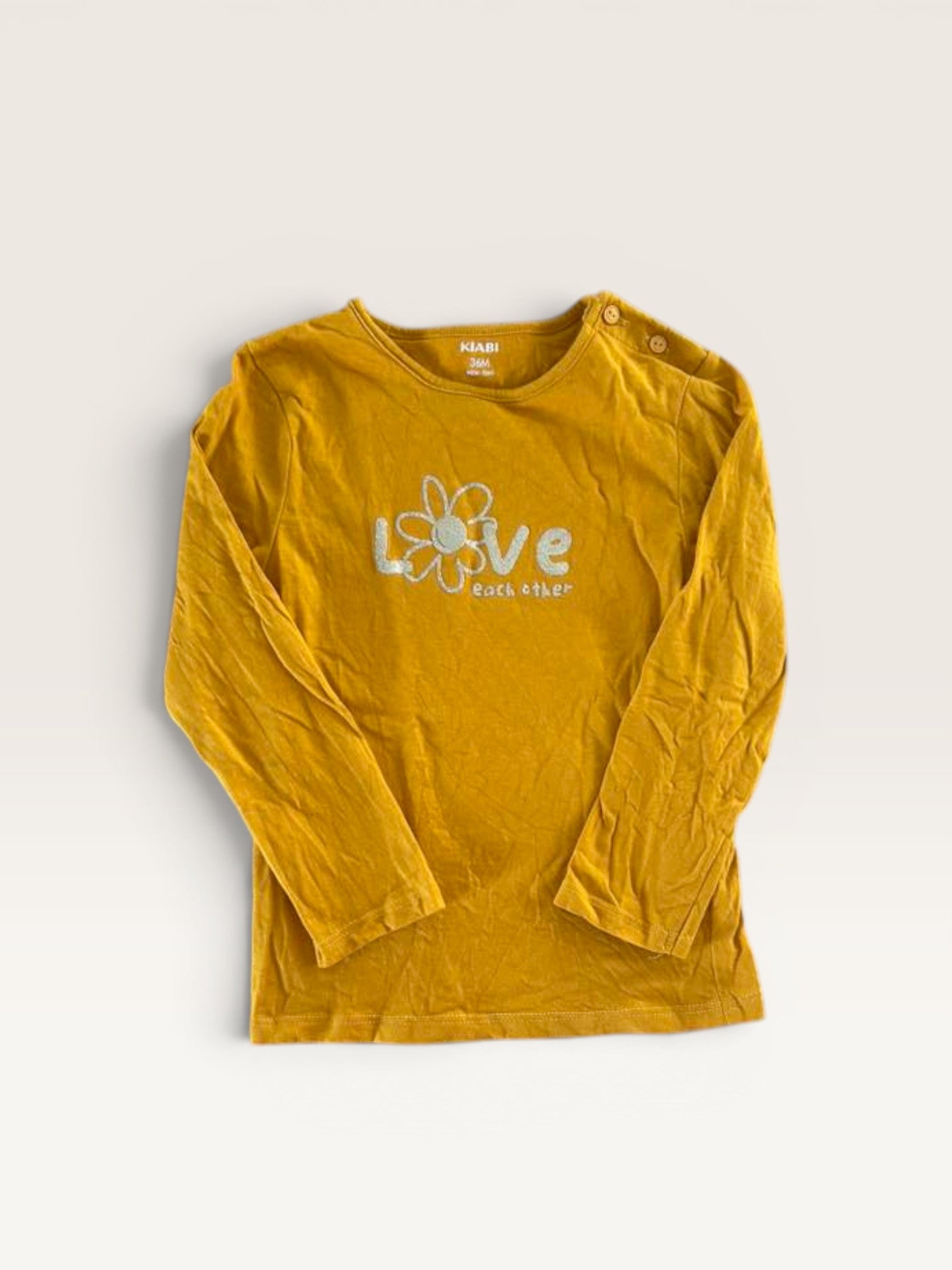 T-shirt manches longues jaune moutarde "love" pailleté Kiabi taille 36 mois