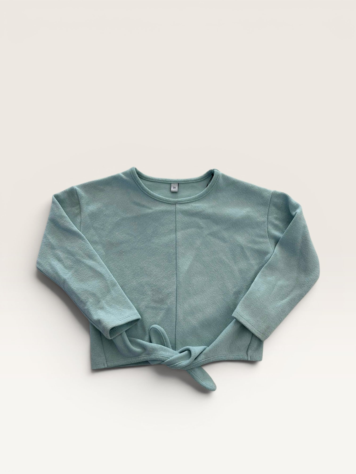 Pull fin bleu avec noeud taille 3 ans