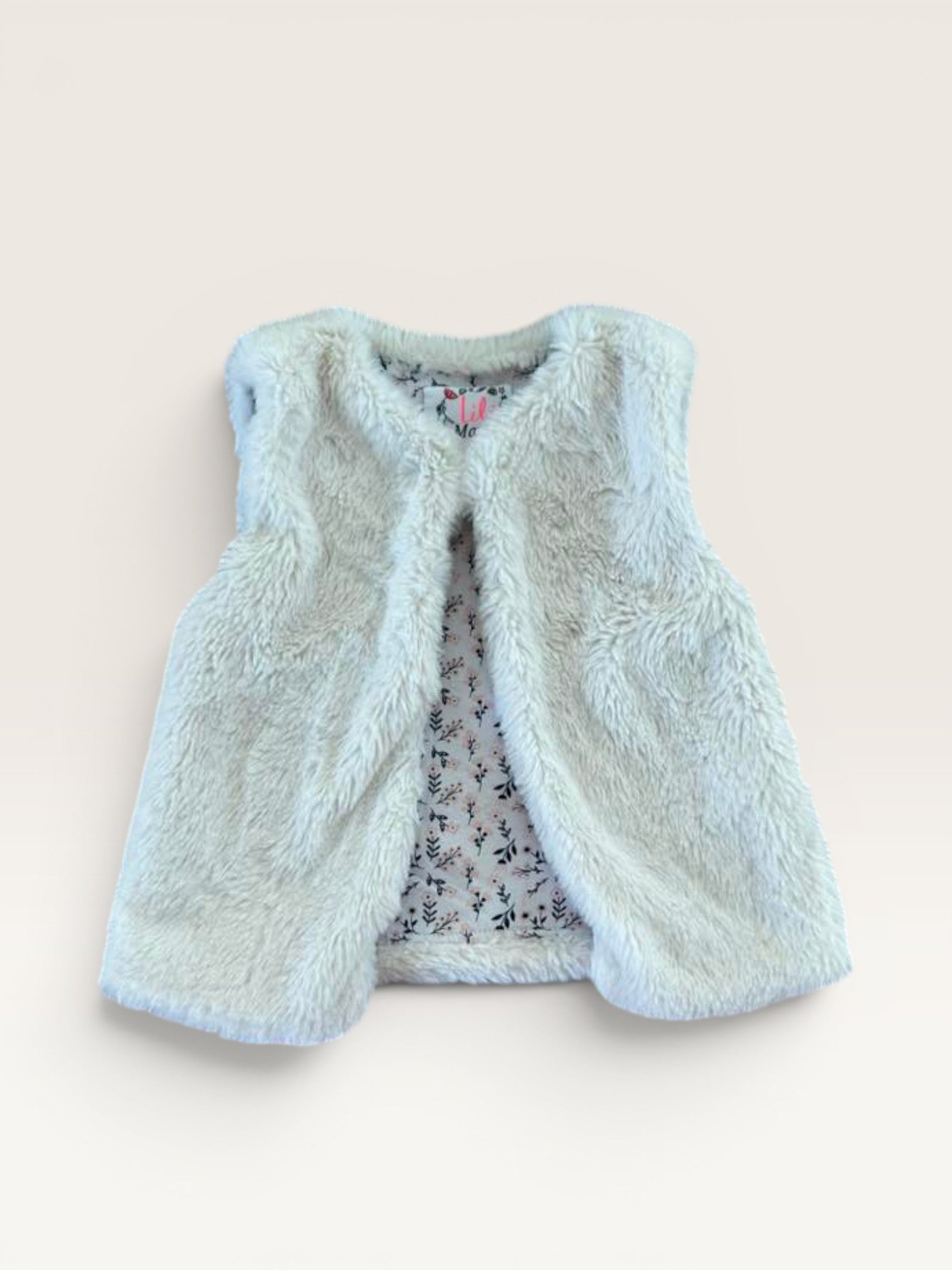 Veste sans manches fausse fourrure blanche Lili Marelle taille 3 ans
