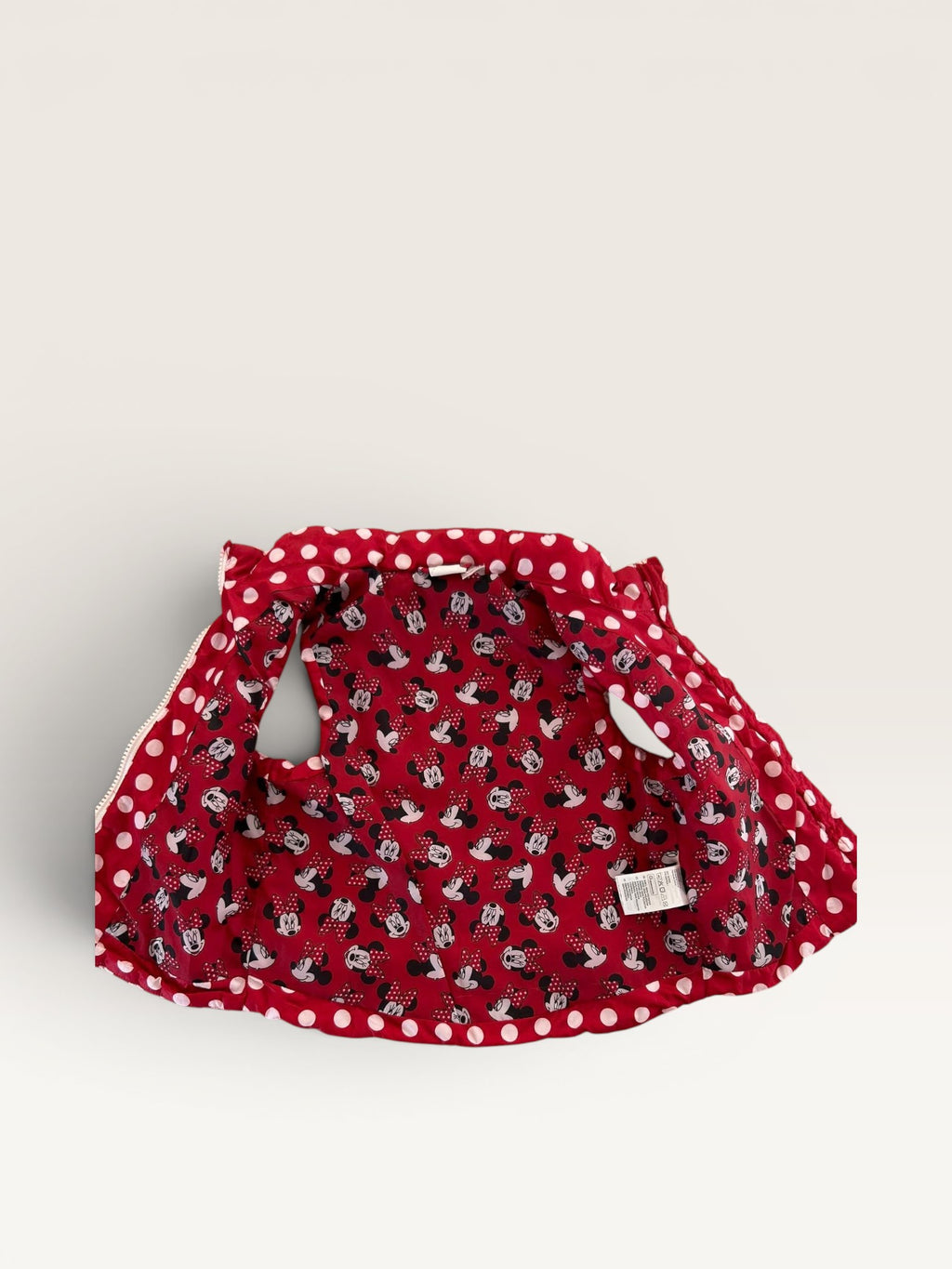 Doudoune sans manches rouge et blanche Minnie taille 2 ans