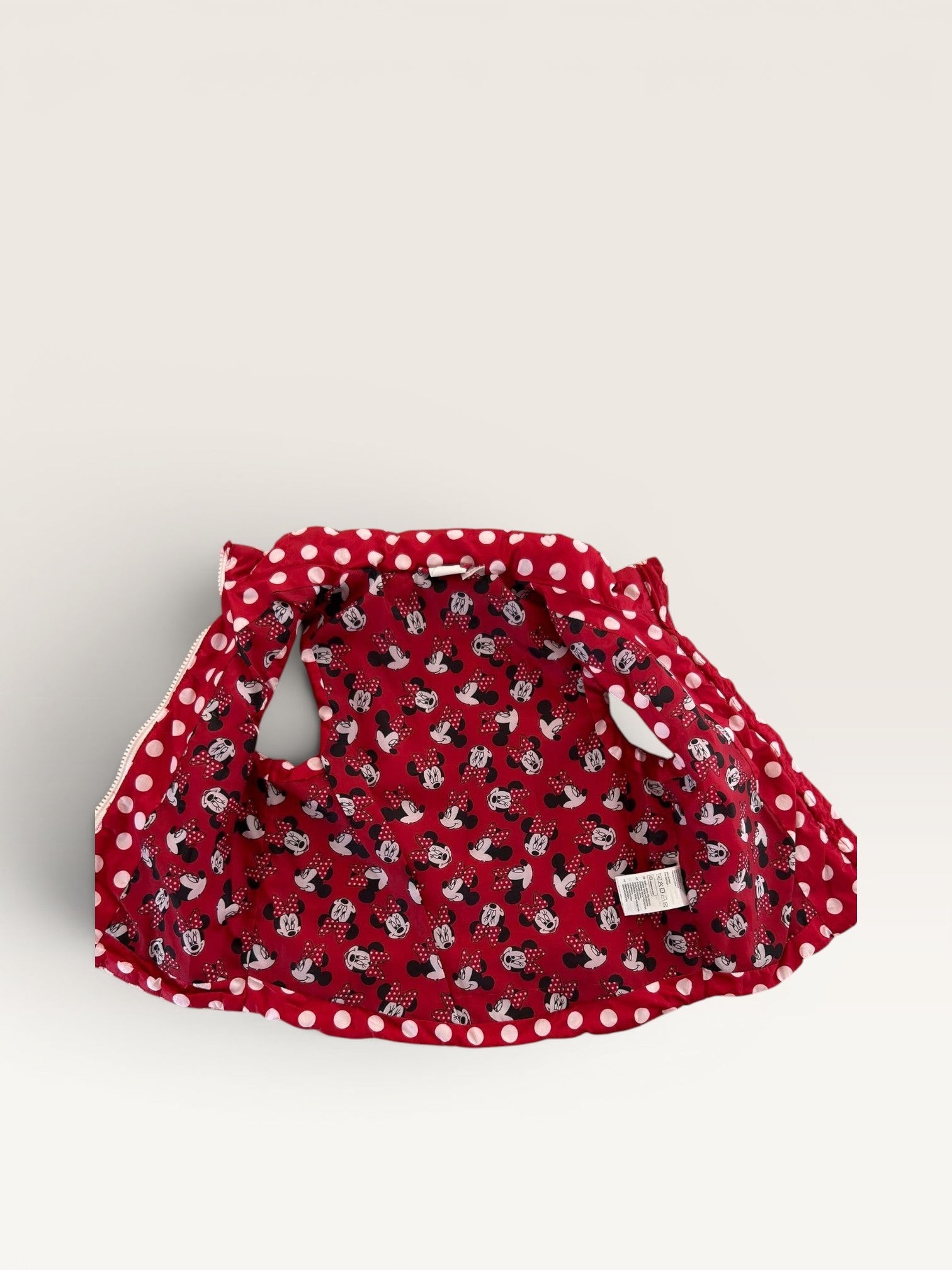 Doudoune sans manches rouge et blanche Minnie taille 2 ans