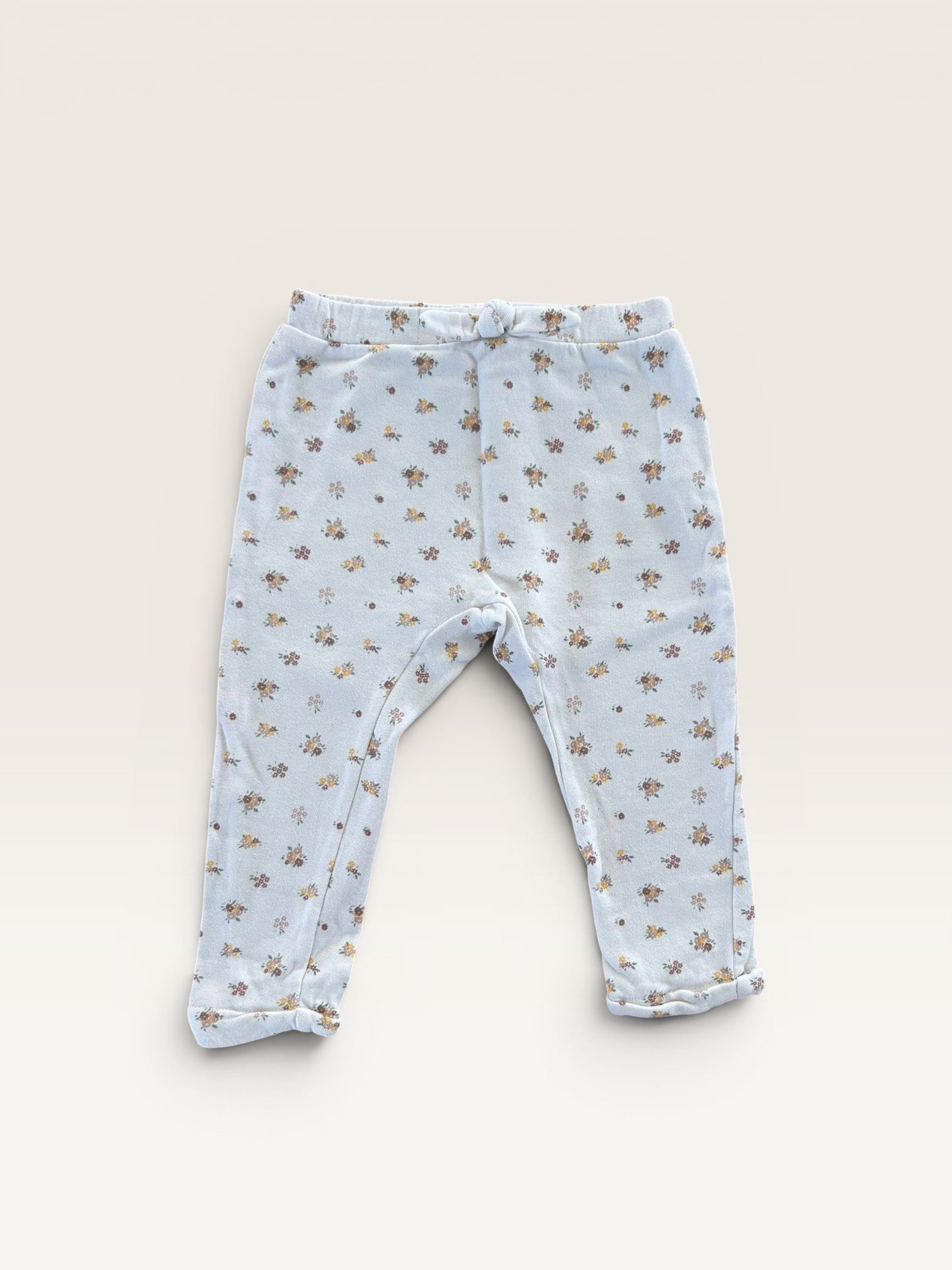 Sarouel molletonné fleuri Kiabi taille 36 mois