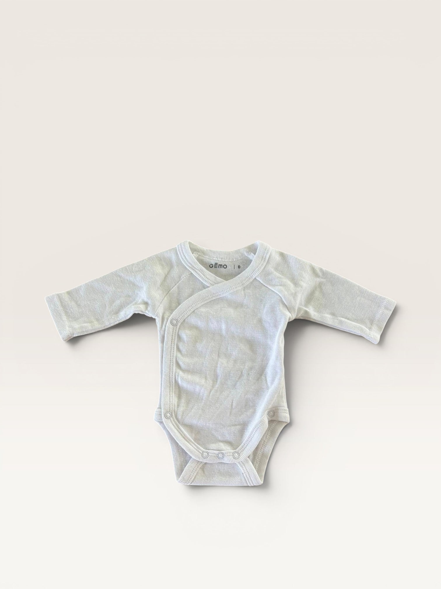 Bodie manches longues blanc Gémo taille 0 mois