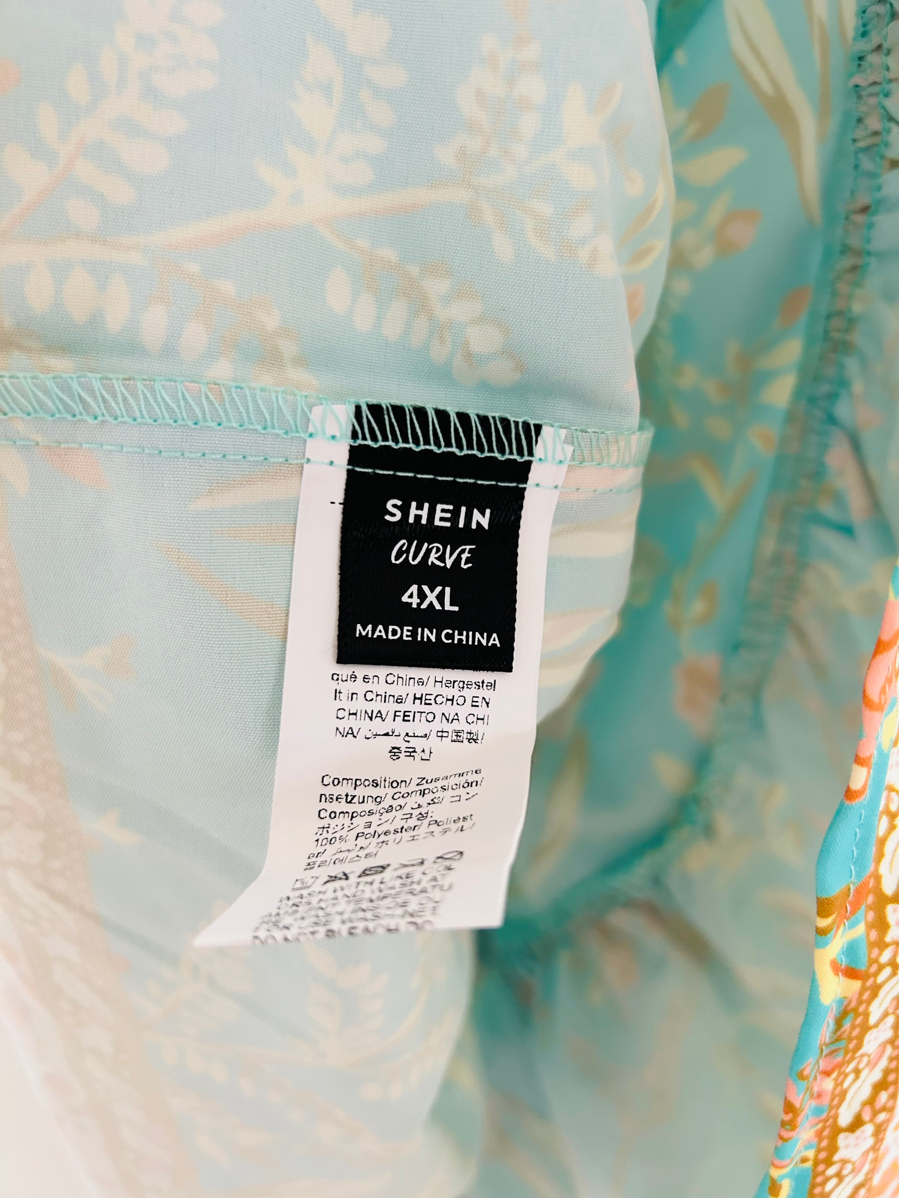 Robe ample et fluide bretelles et manches courtes épaules dénudées coloris turquoise imprimé SHEIN taille 52