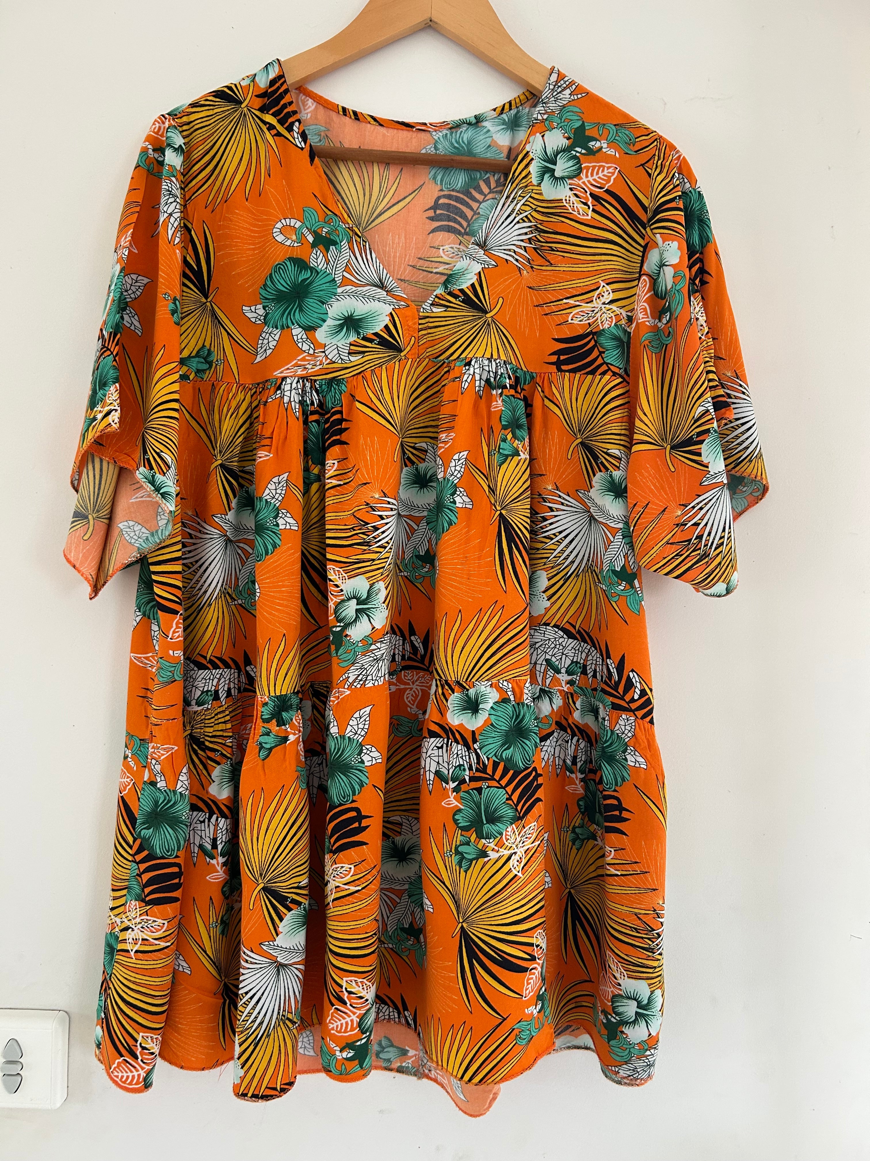 Top péplum manches courtes motif tropical taille 54
