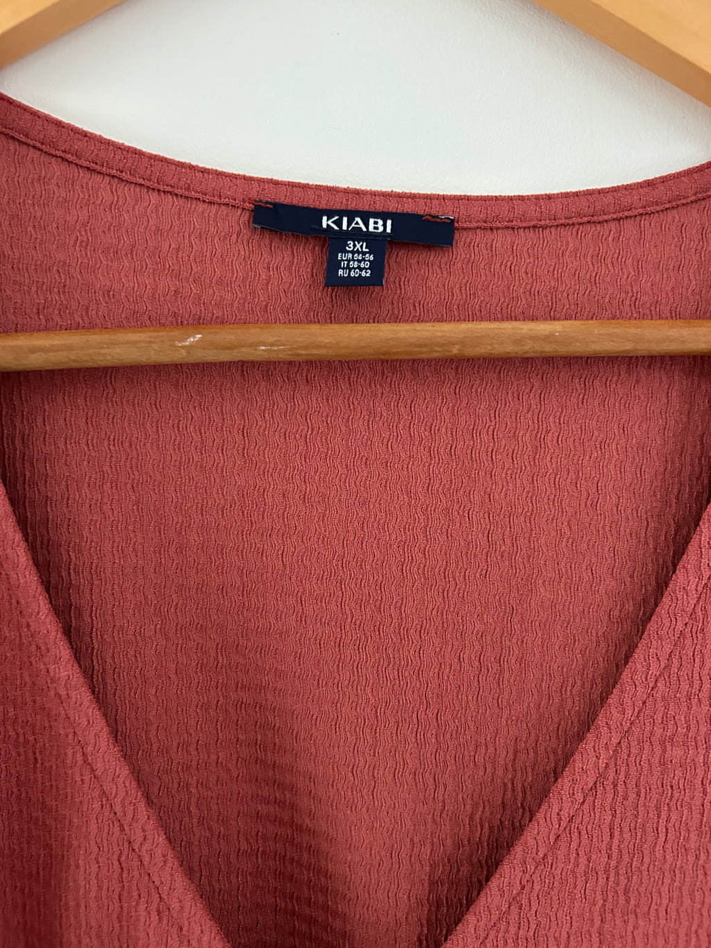 Top corail manches courtes et boutons Kiabi taille 54/56